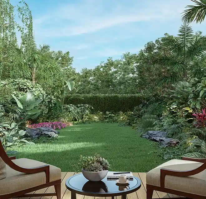 Chairs in a landscaped backyard.