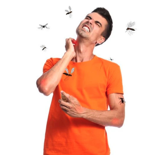 guy wearing orange shirt, which mosquitoes are drawn to, being swarmed by mosquitoes